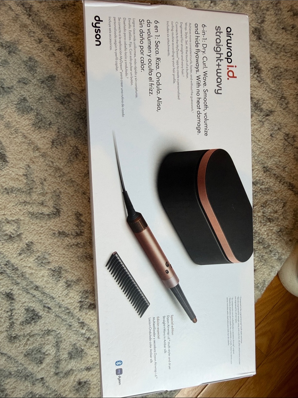 Dyson hair styler in black and rose gold